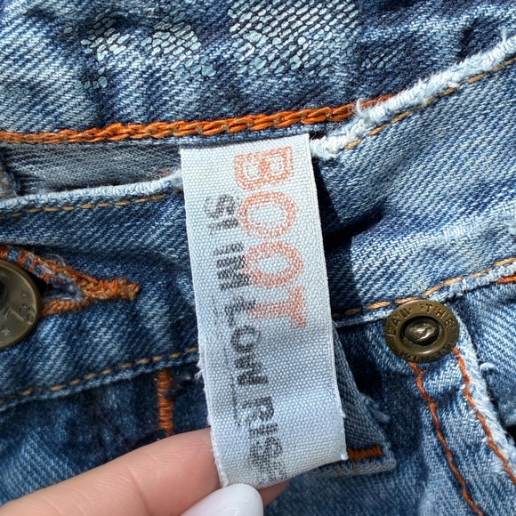 Low Rise Distressed Jeans - Picture 6 of 10